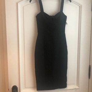 Fitted black knee length dress